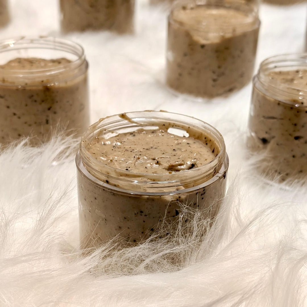 Coffee Face Scrub in a jar with ground coffee texture
