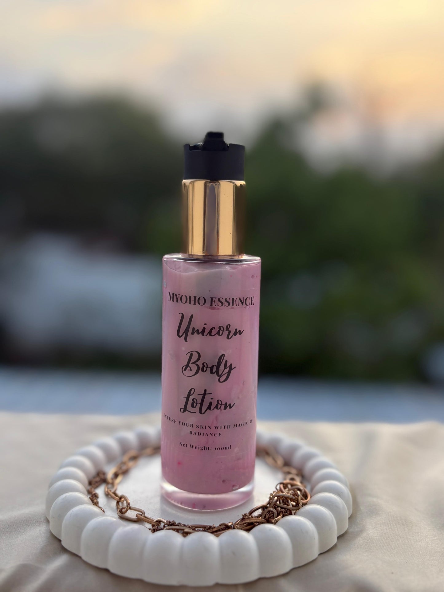 Bottle of Unicorn Body Lotion with pastel-coloured label.